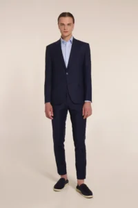 The dark blue wool suit with invisible stripes