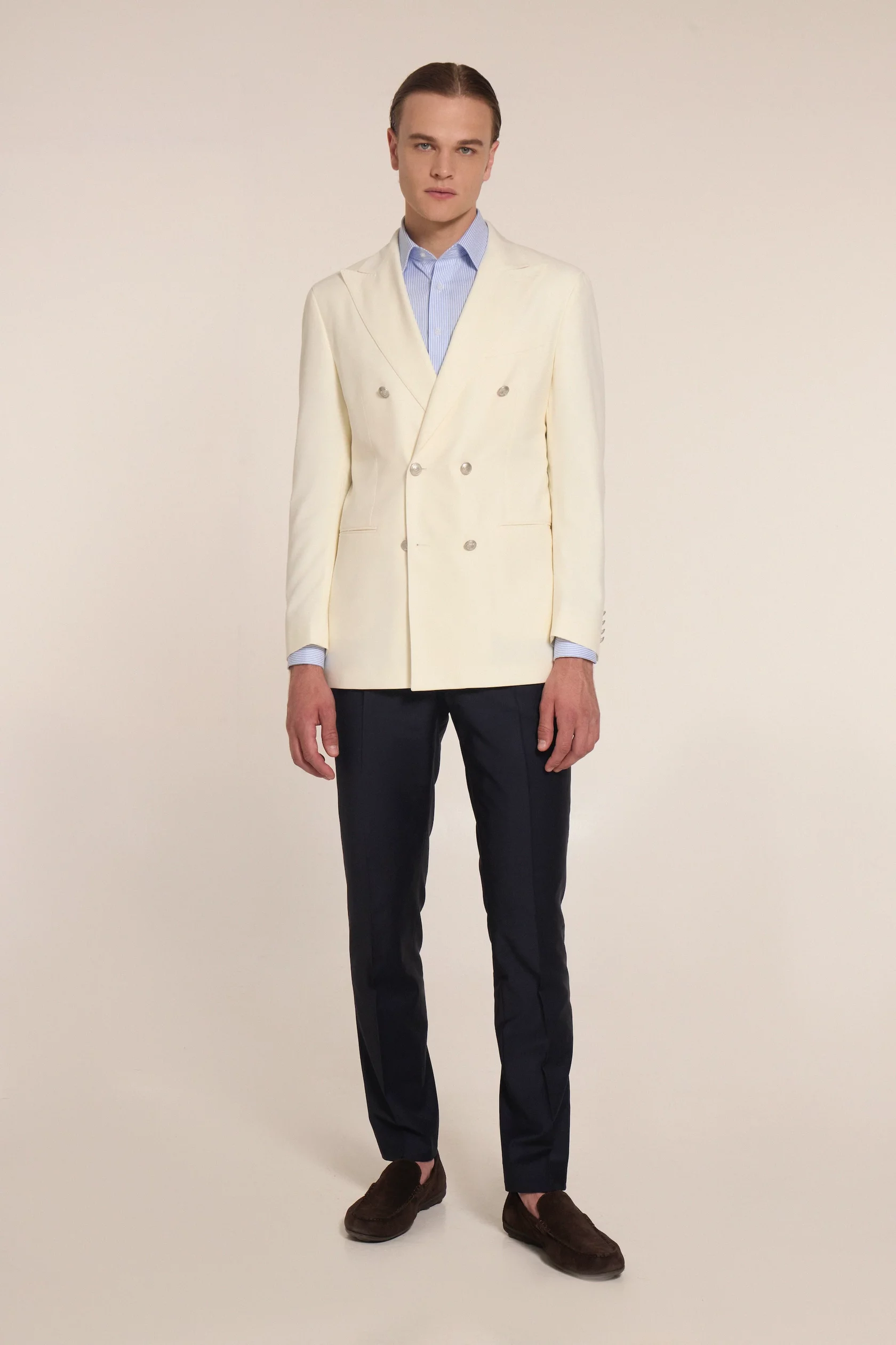 The creme double-breasted blazer